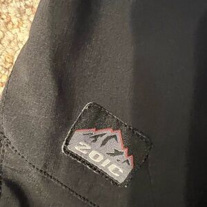Zoic Ether Mountain bike shorts, cinch waist, multiple zipper pockets.